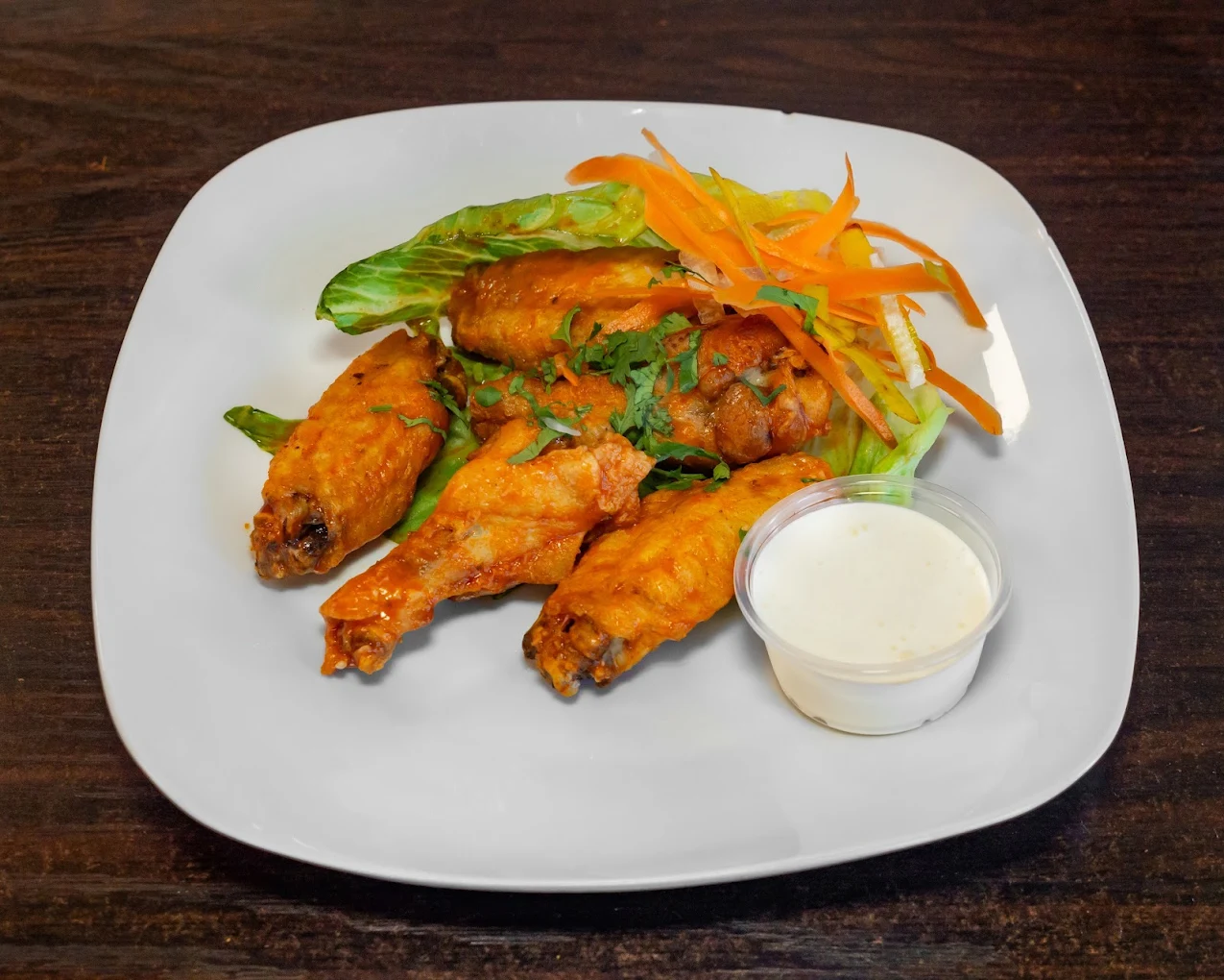 Chicken Wings - Flavorful chicken wings.